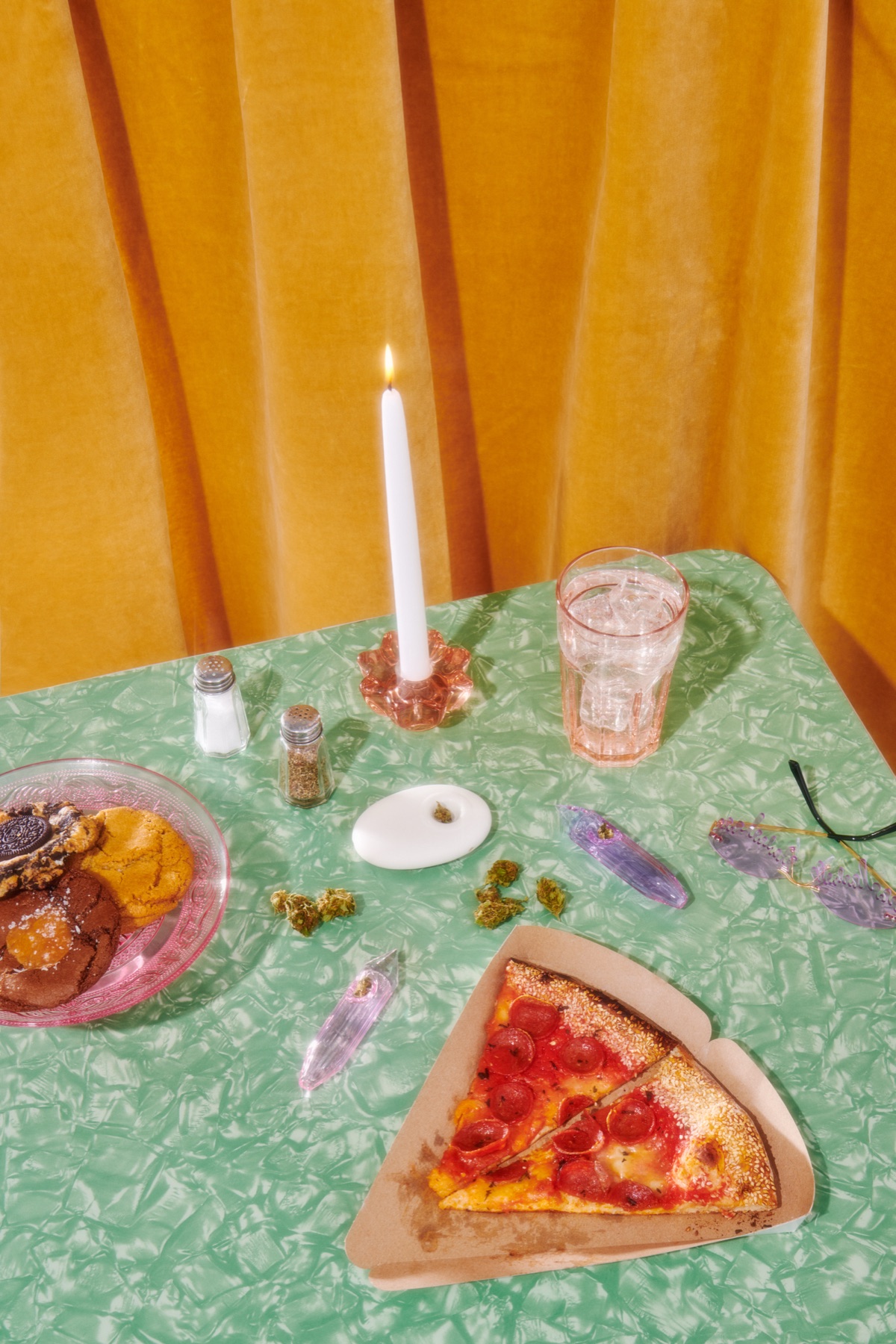 Drool accessories arranged on a colourful pizza table